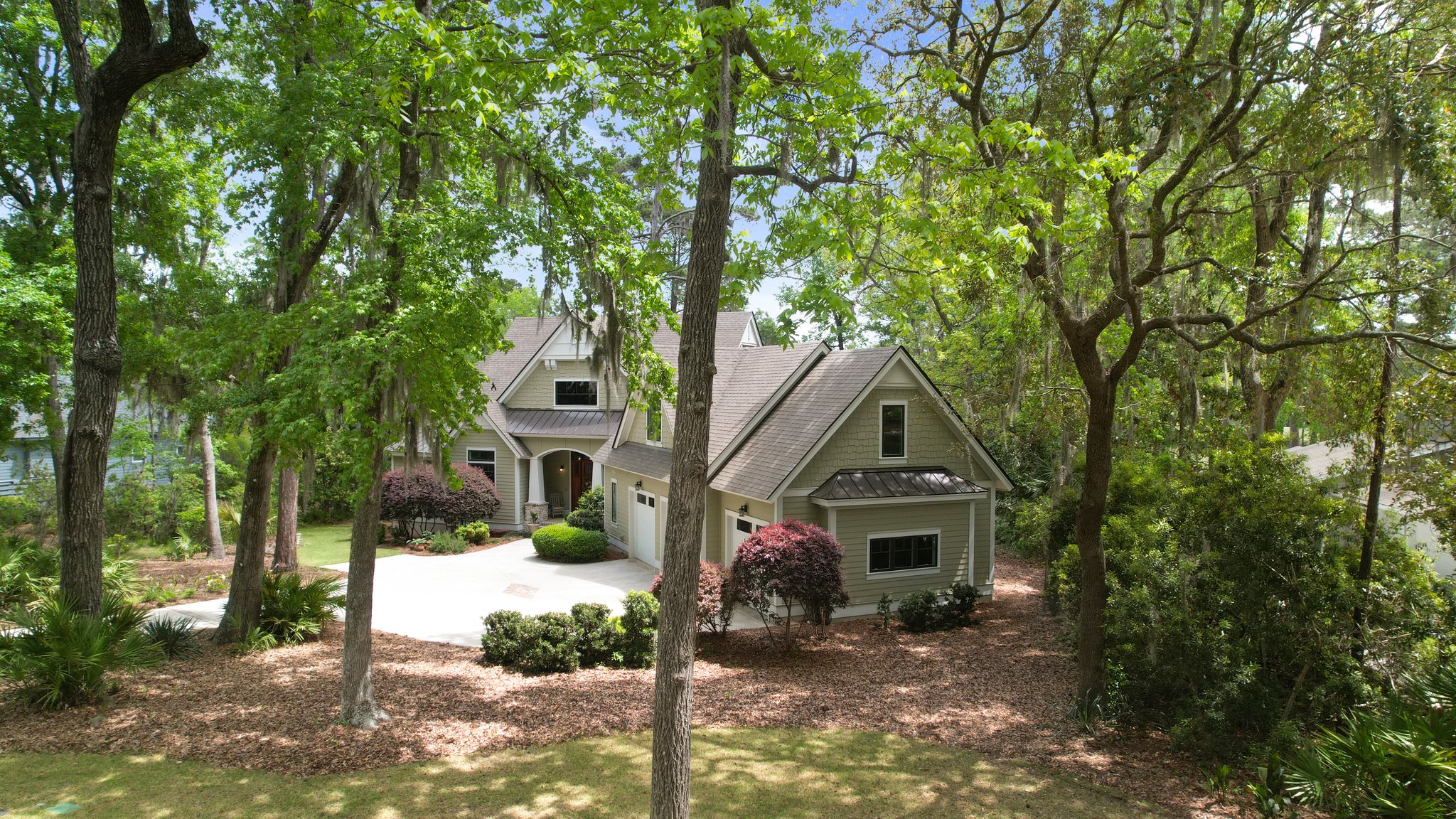 Custom-built Moss Creek home with lagoon and golf course views from 128 Timber Lane in Bluffton SC